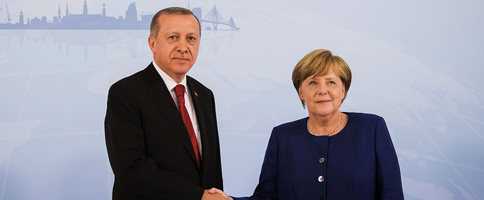 Erdoğan Merkel’le görüştü